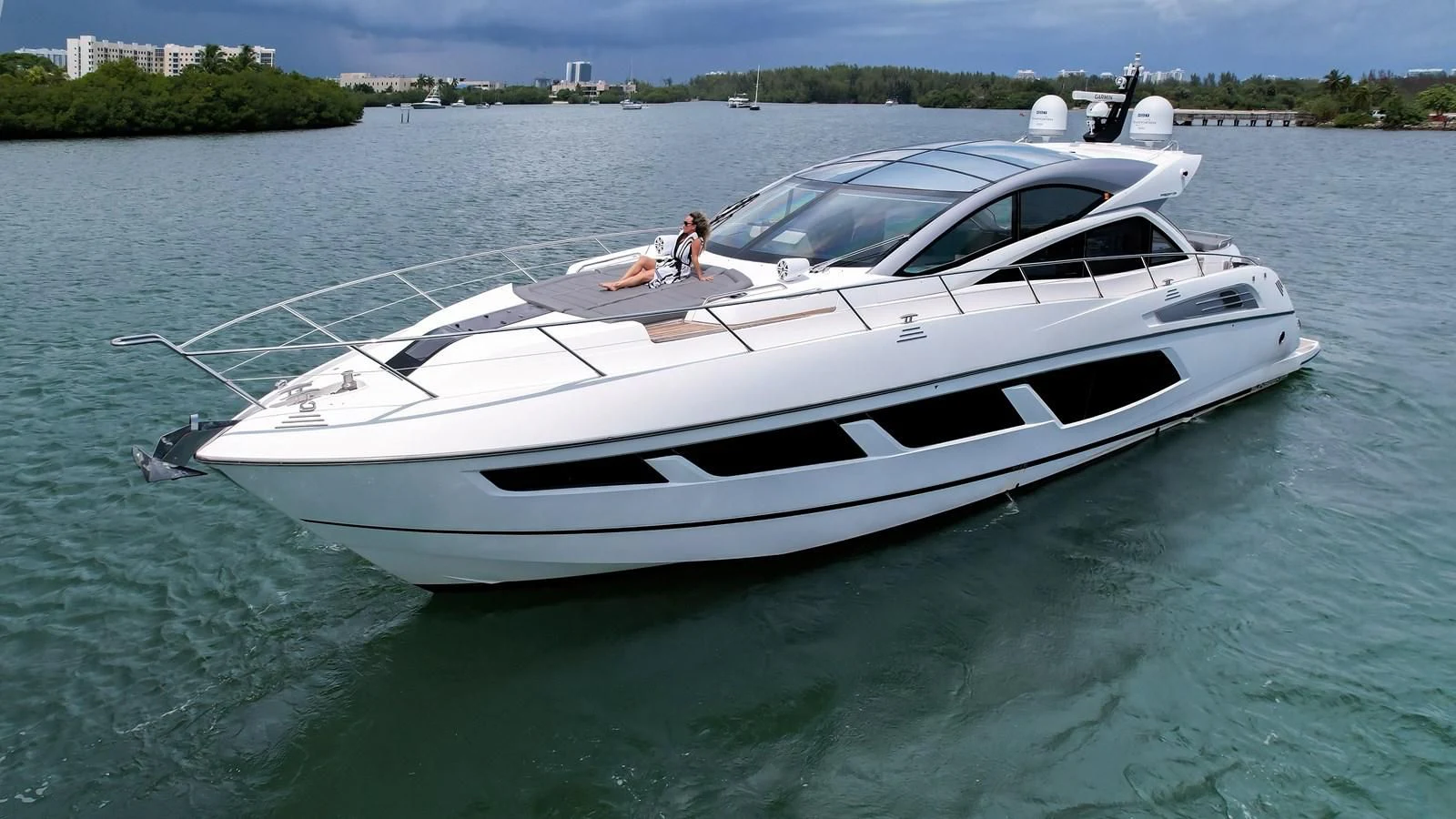 a white yacht on the water aboard SUNSEEKER PREDATOR 68 Yacht for Sale