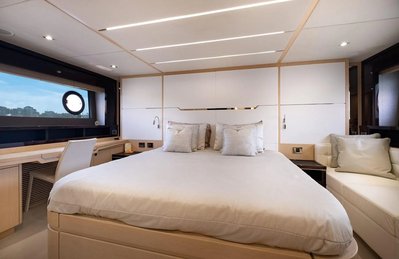 a room with a bed and a television aboard SUNSEEKER PREDATOR 68 Yacht for Sale