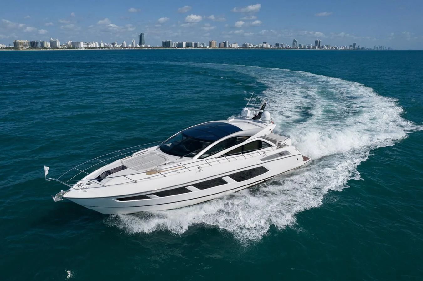 a white yacht on the water aboard SUNSEEKER PREDATOR 68 Yacht for Sale