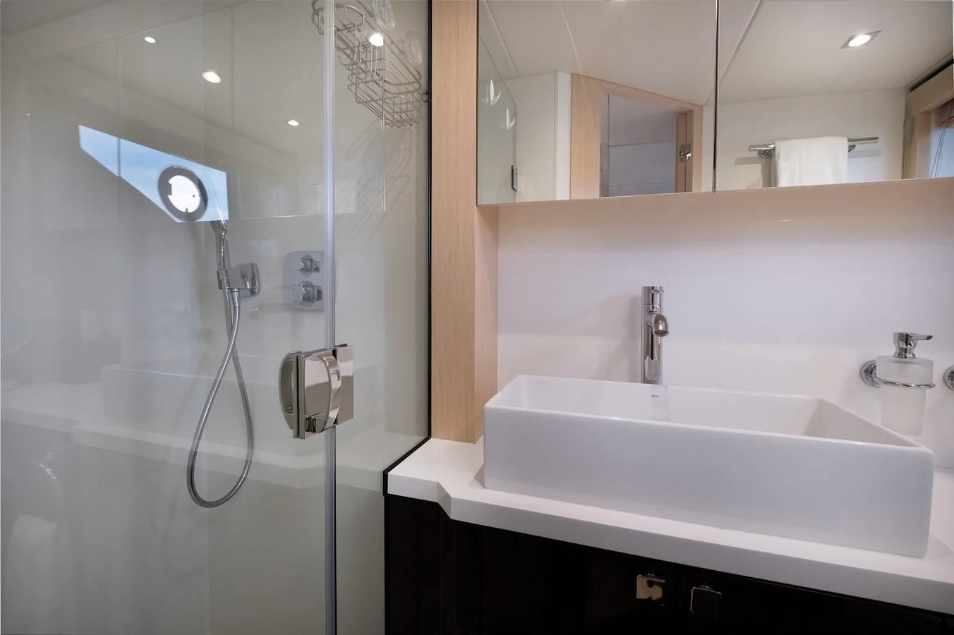 a bathroom with a glass shower aboard SUNSEEKER PREDATOR 68 Yacht for Sale