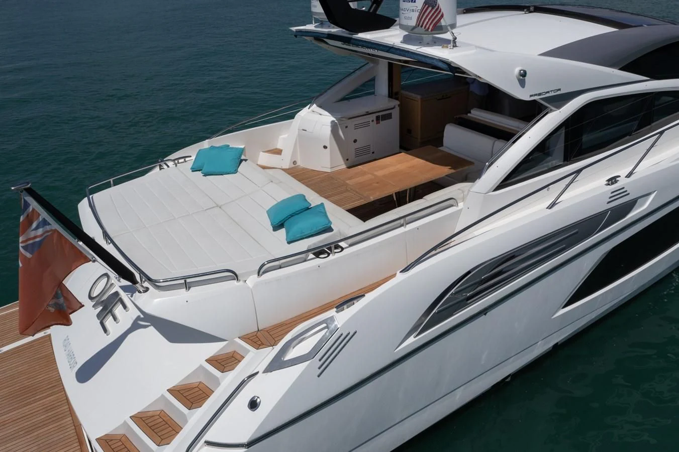 a white boat on a deck aboard SUNSEEKER PREDATOR 68 Yacht for Sale