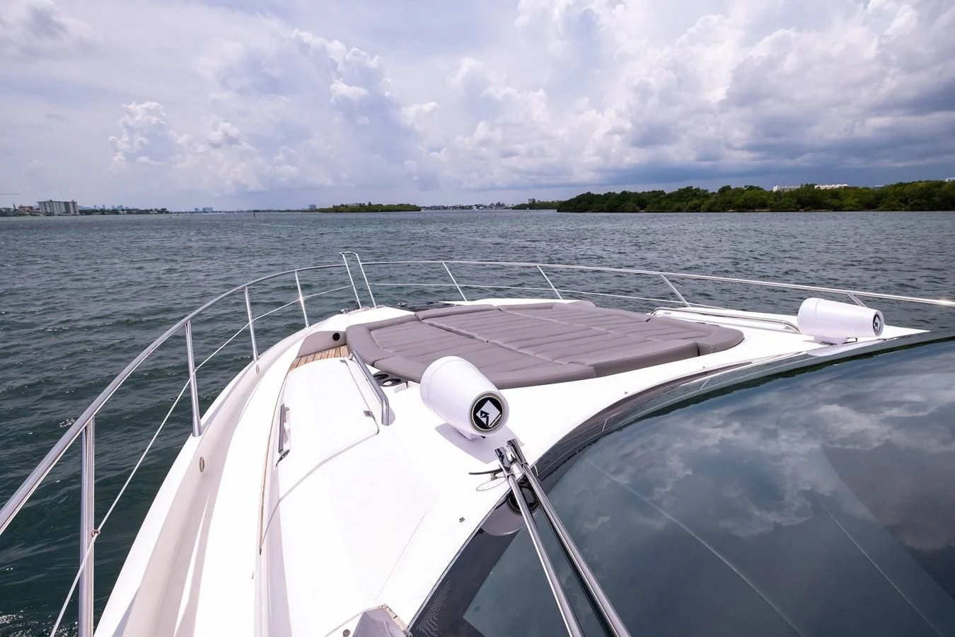 a boat on the water aboard SUNSEEKER PREDATOR 68 Yacht for Sale