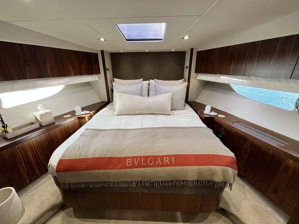 a bed in a room aboard SUNSEEKER PREDATOR 68 Yacht for Sale