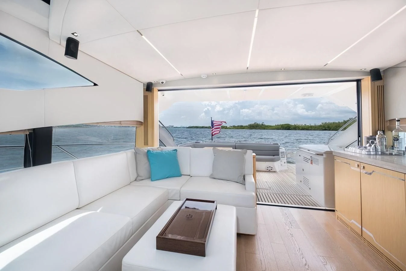 a room with a large window and a view of the ocean aboard SUNSEEKER PREDATOR 68 Yacht for Sale