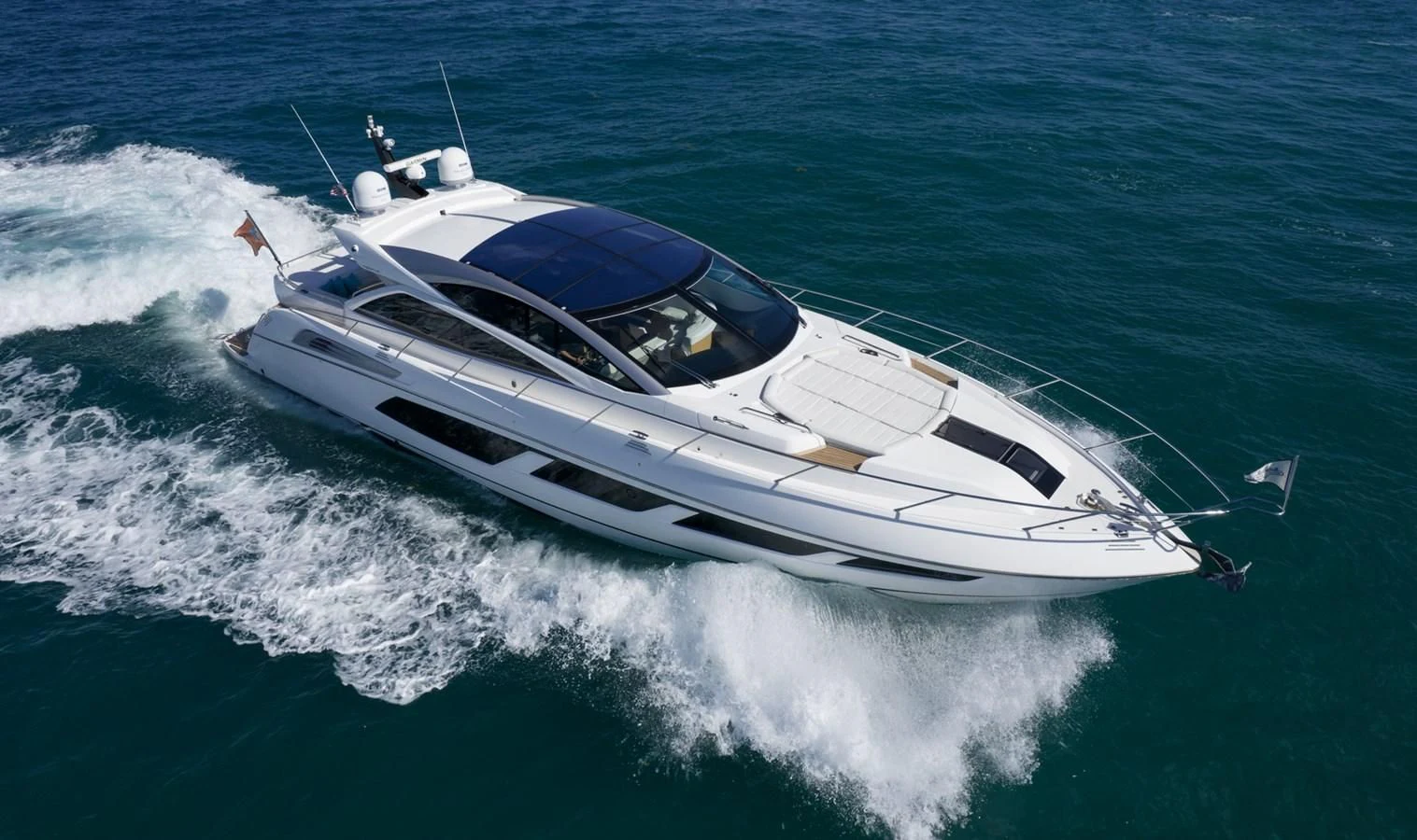 a boat on the water aboard SUNSEEKER PREDATOR 68 Yacht for Sale