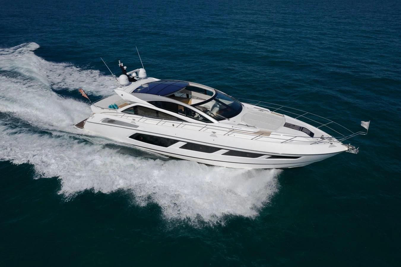 a boat on the water aboard SUNSEEKER PREDATOR 68 Yacht for Sale
