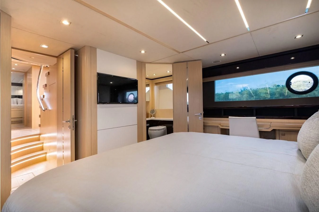 a large bed in a room aboard SUNSEEKER PREDATOR 68 Yacht for Sale