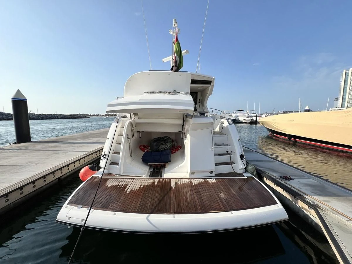 a boat docked at a pier aboard SUNSEEKER PREDATOR 68 Yacht for Sale