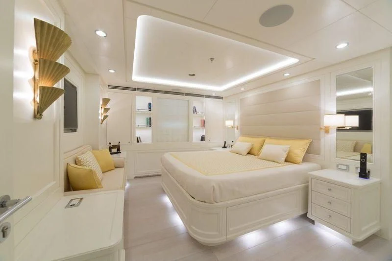 a modern bedroom with a bed aboard DRAGOLUNA Yacht for Sale