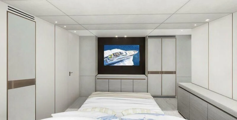 a room with a tv on the wall aboard NADA Yacht for Sale