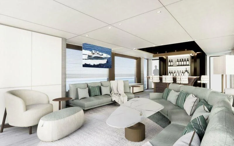 a living room with a couch and a table aboard NADA Yacht for Sale