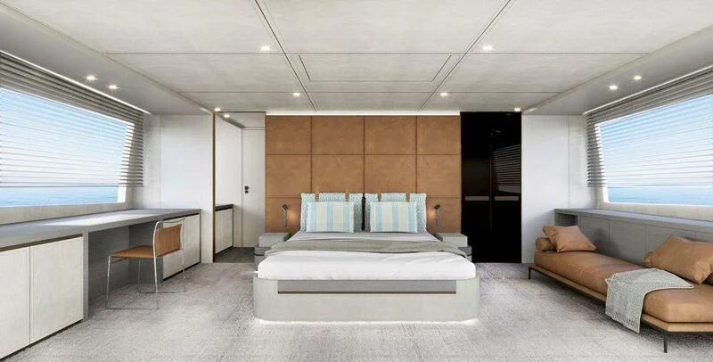 a large room with a couch and a desk aboard NADA Yacht for Sale