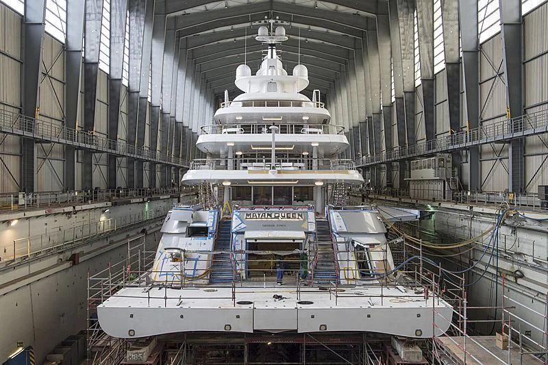 a large white ship in a large building aboard MAYAN QUEEN IV Yacht for Sale