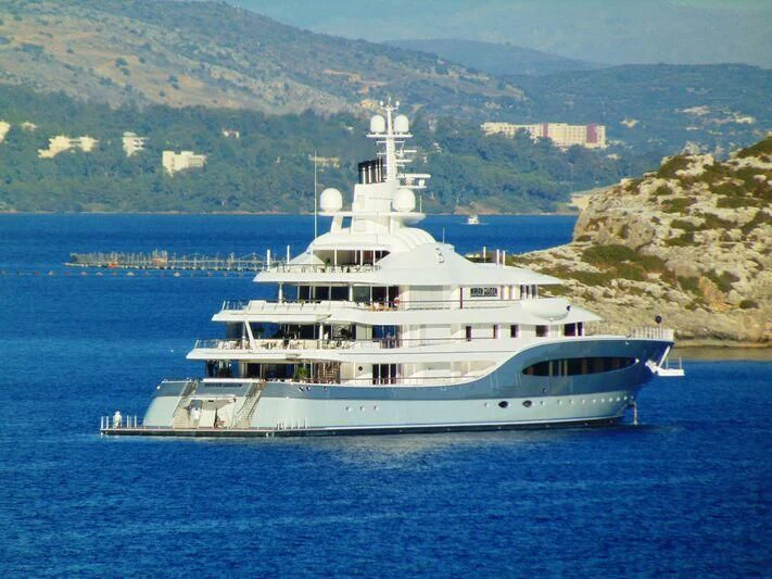 a large white boat in the water aboard MAYAN QUEEN IV Yacht for Sale