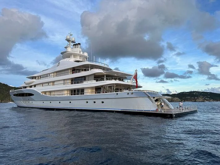 a large white boat on the water aboard MAYAN QUEEN IV Yacht for Sale
