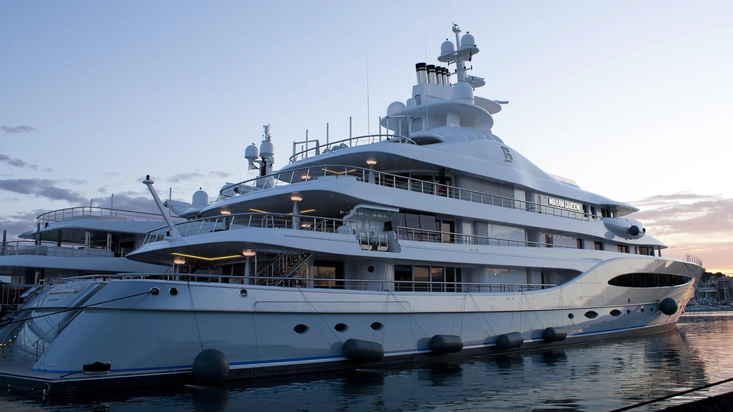 a large white yacht aboard MAYAN QUEEN IV Yacht for Sale