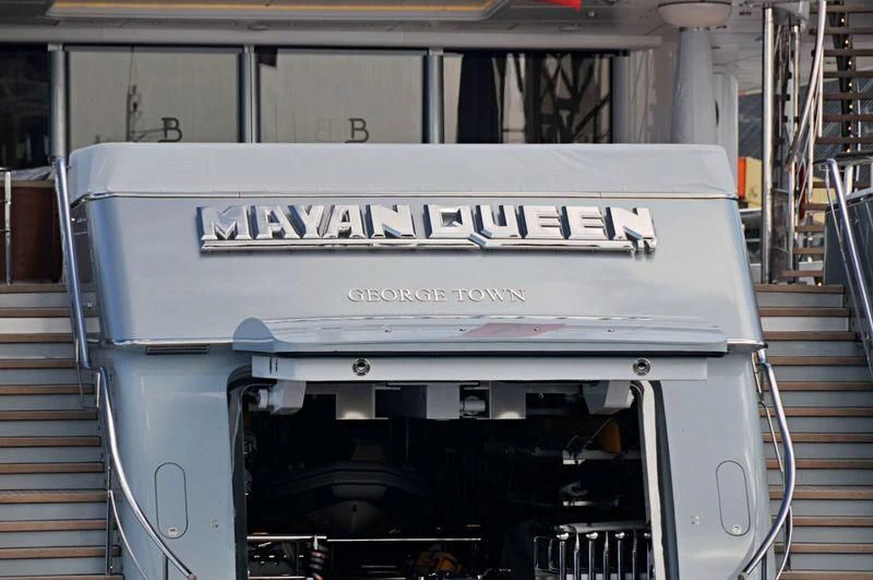 a white truck with a sign on the back aboard MAYAN QUEEN IV Yacht for Sale