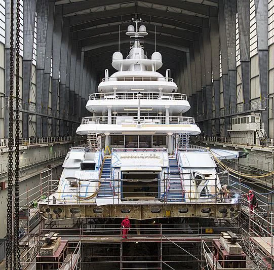 a large ship in a large building aboard MAYAN QUEEN IV Yacht for Sale