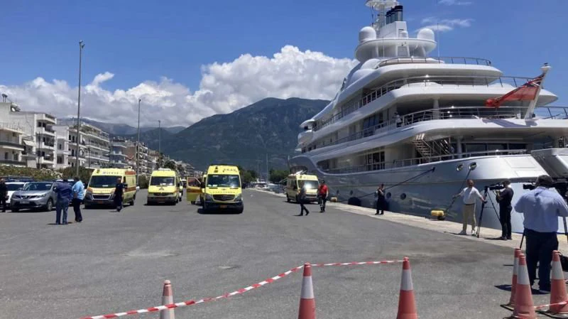 a large ship docked at a port aboard MAYAN QUEEN IV Yacht for Sale