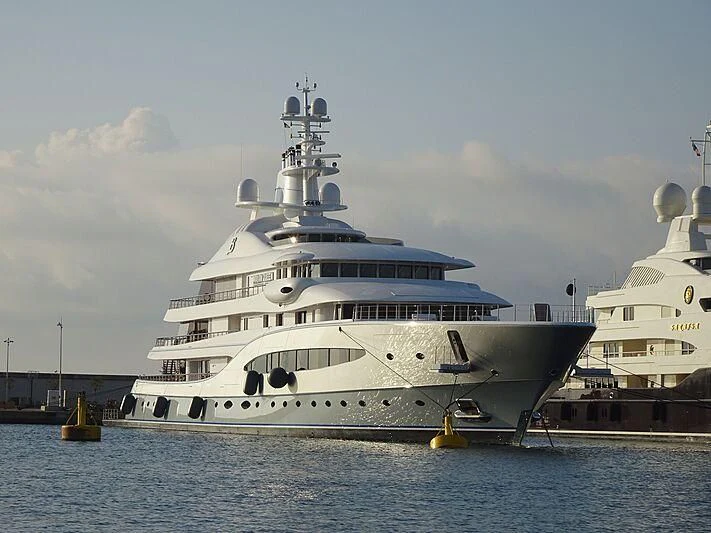 a large cruise ship in the water aboard MAYAN QUEEN IV Yacht for Sale