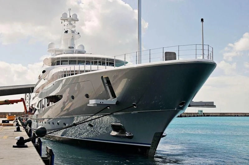 a large white ship docked aboard MAYAN QUEEN IV Yacht for Sale