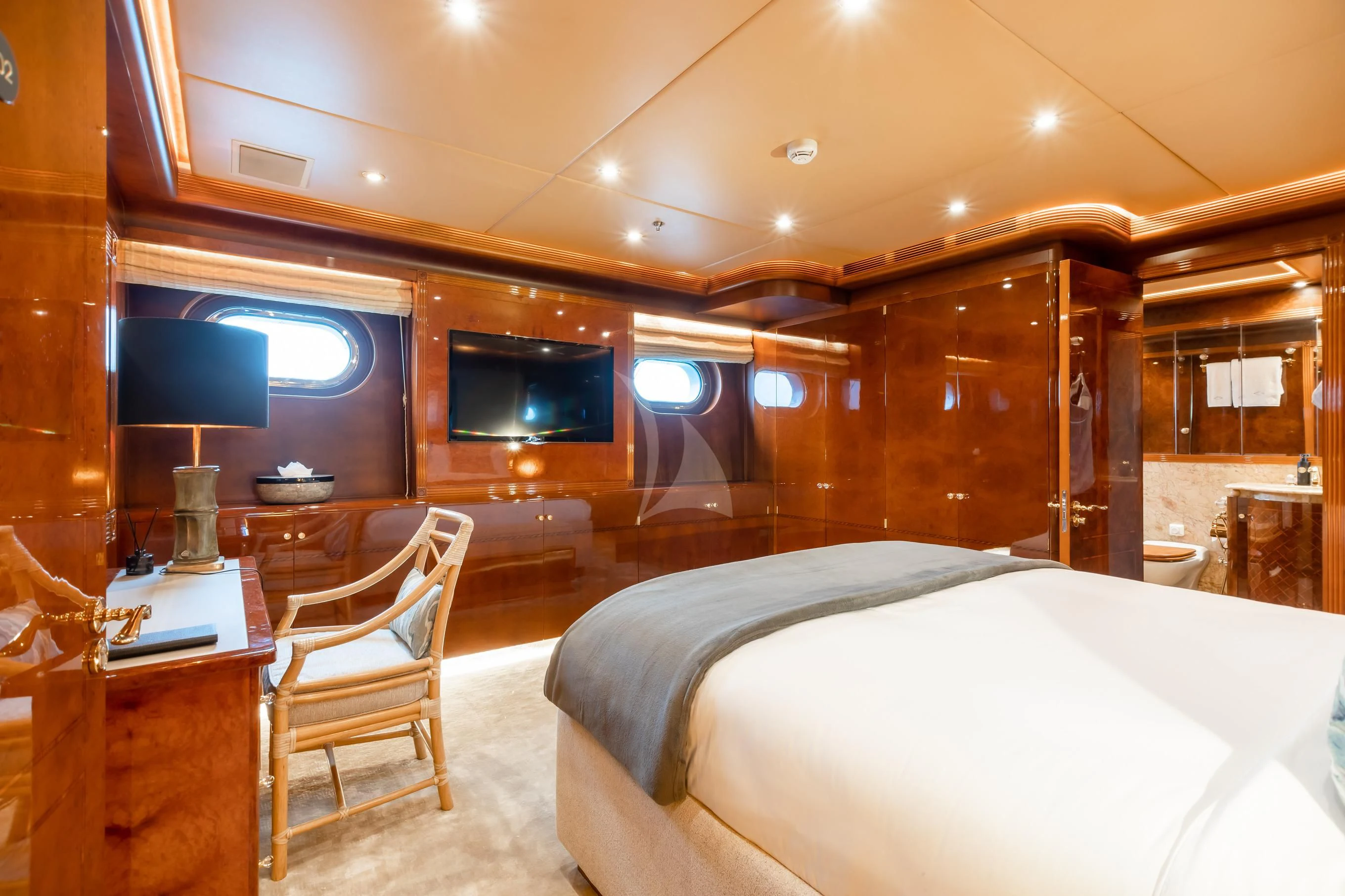 a room with a bed and a tv aboard AQUA MARE Yacht for Sale