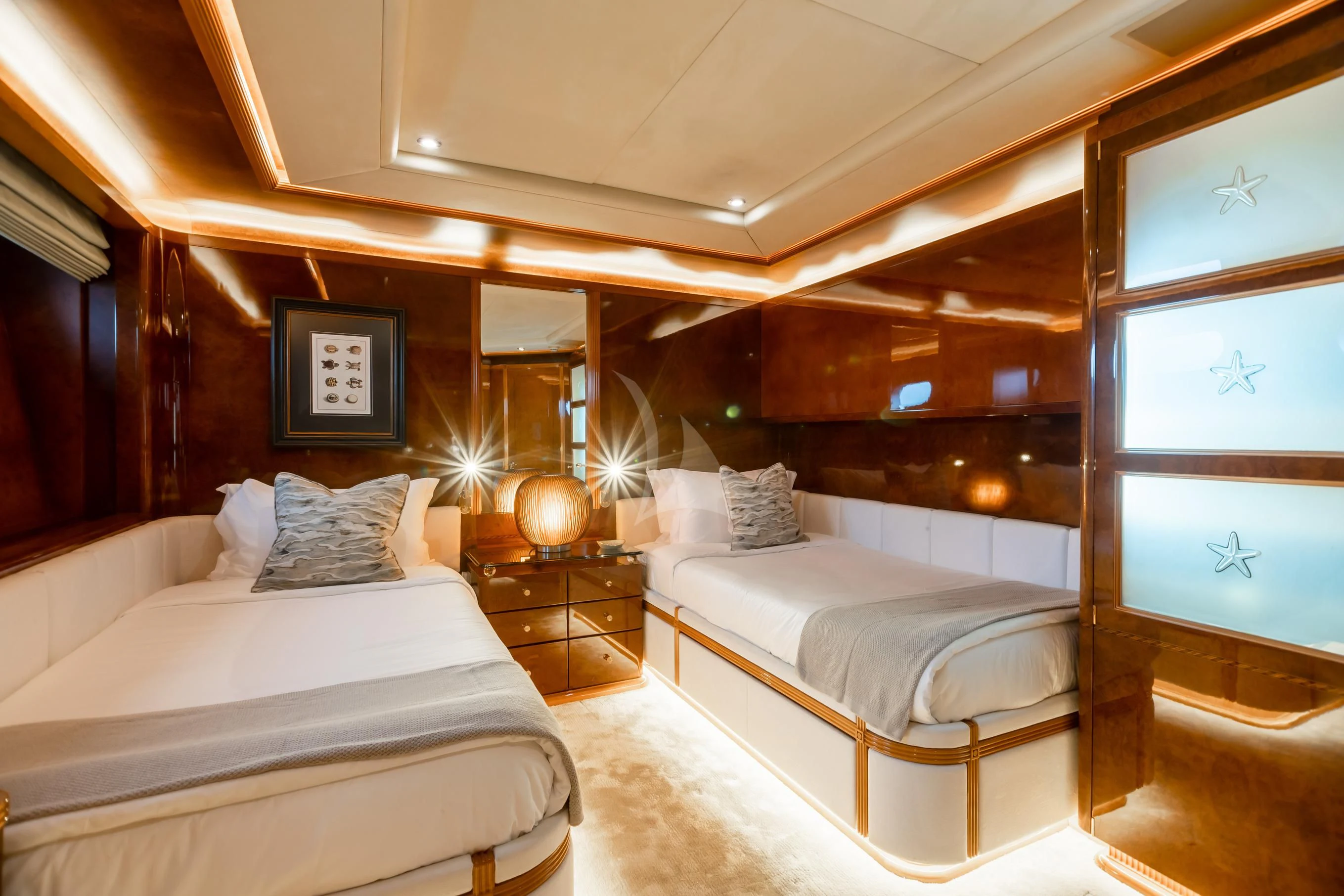 a room with two beds aboard AQUA MARE Yacht for Sale