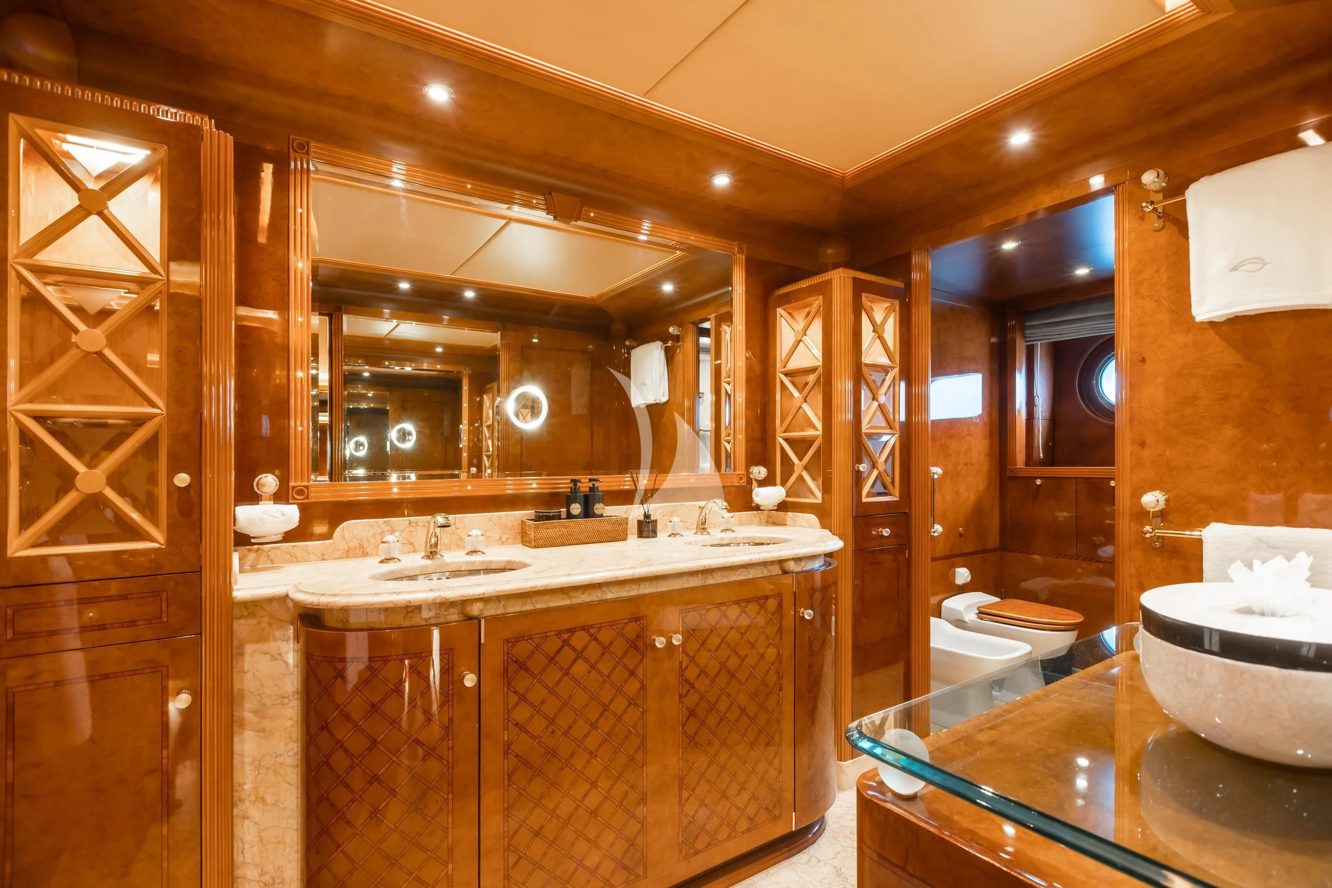a bathroom with a large mirror aboard AQUA MARE Yacht for Sale