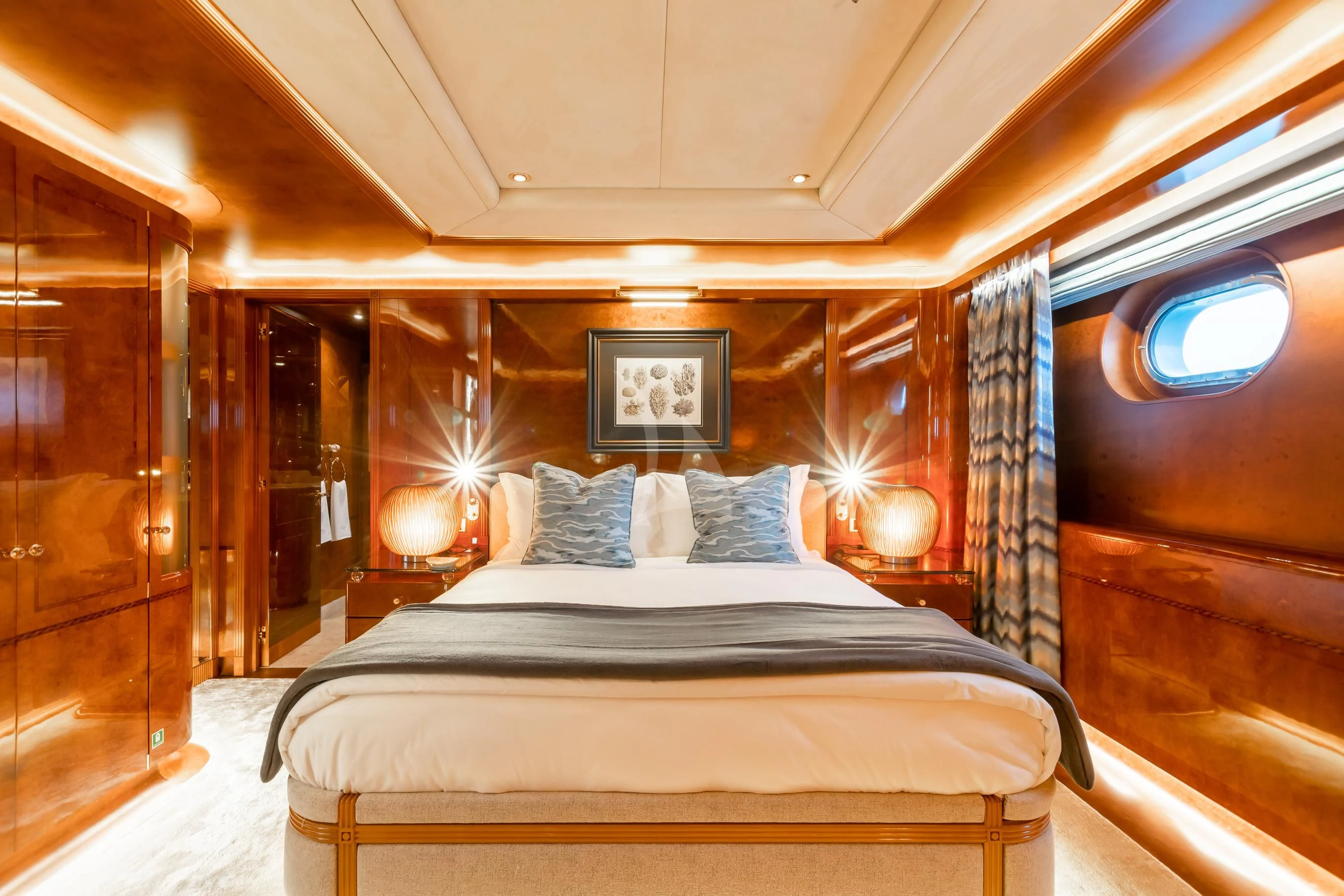 a room with a bed and a window aboard AQUA MARE Yacht for Sale