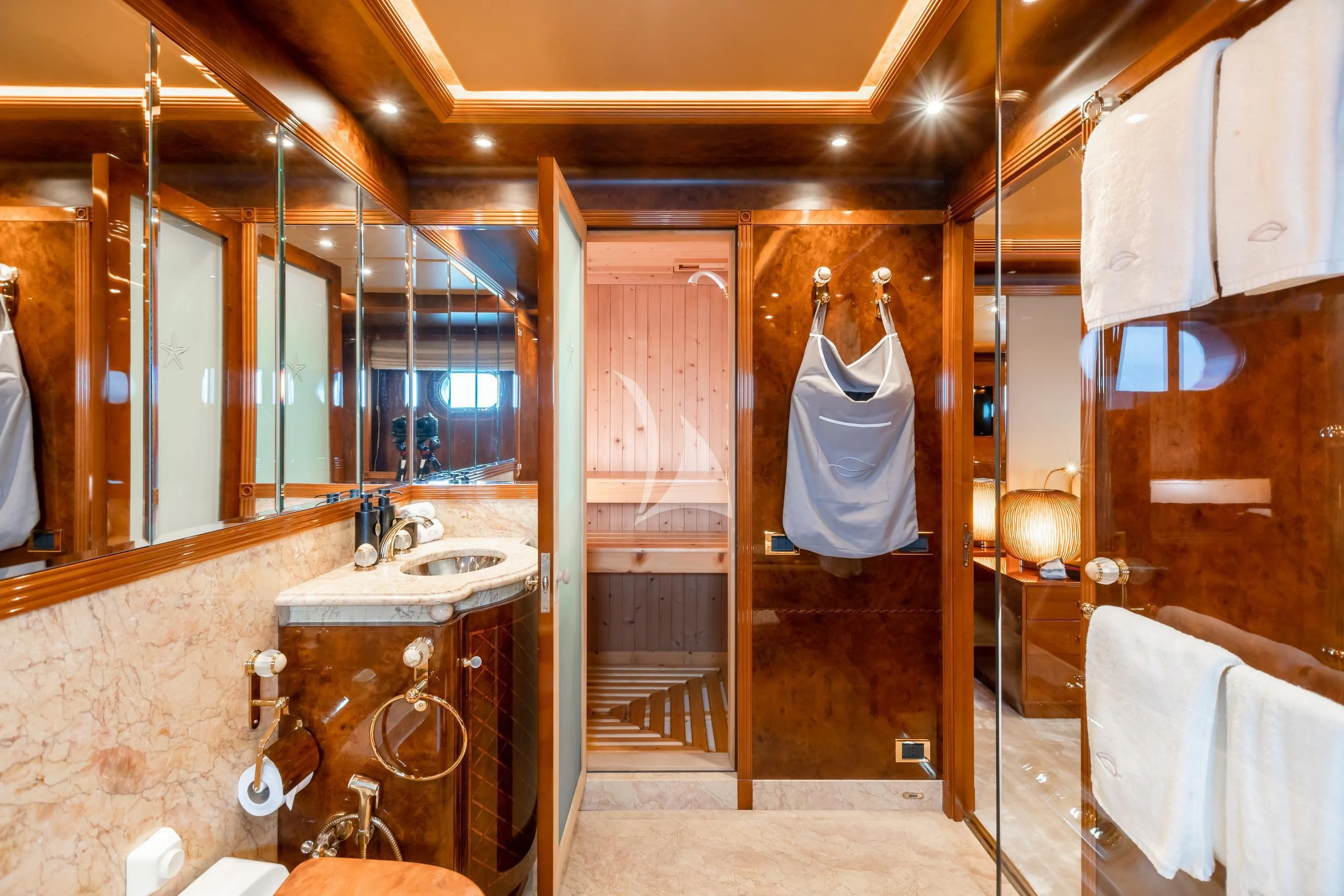 a bathroom with a sink and mirror aboard AQUA MARE Yacht for Sale