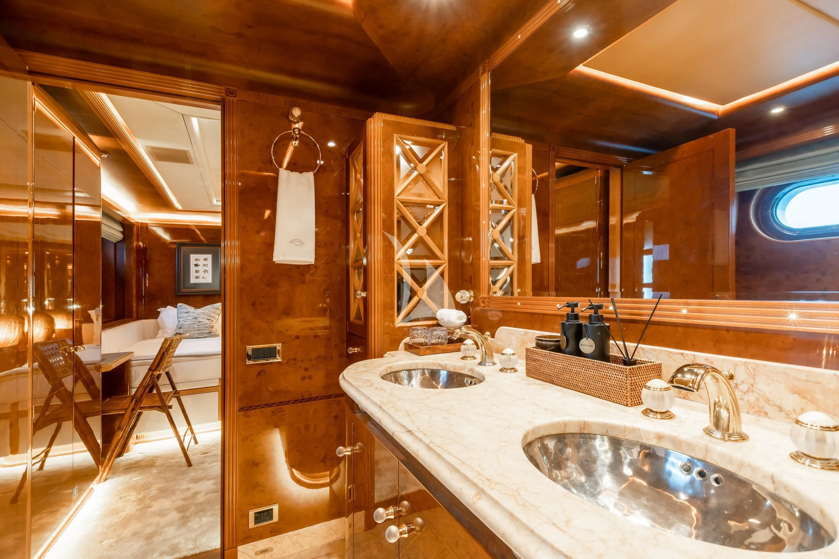 a bathroom with sinks and mirrors aboard AQUA MARE Yacht for Sale