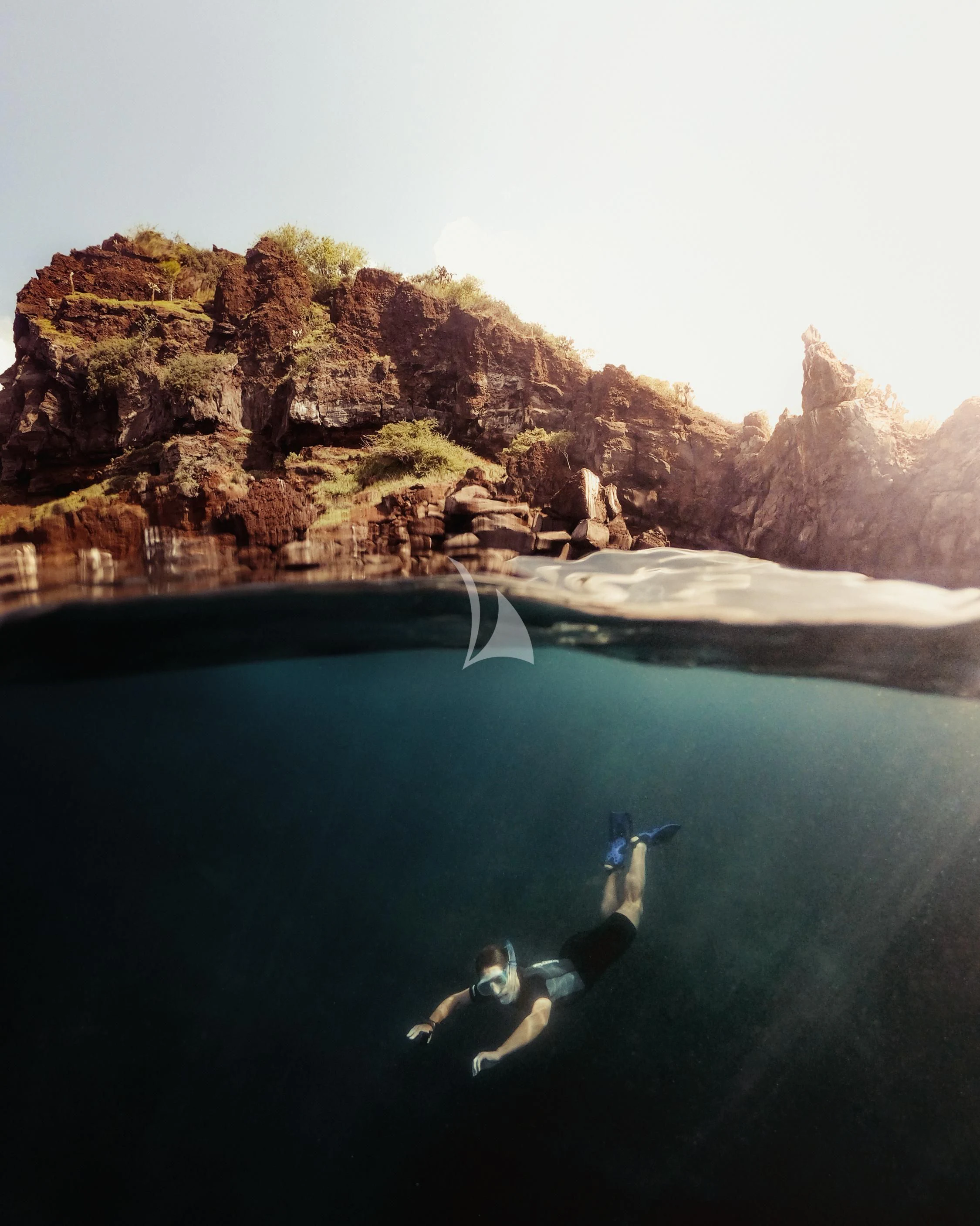 a group of people swimming in a body of water aboard AQUA MARE Yacht for Sale