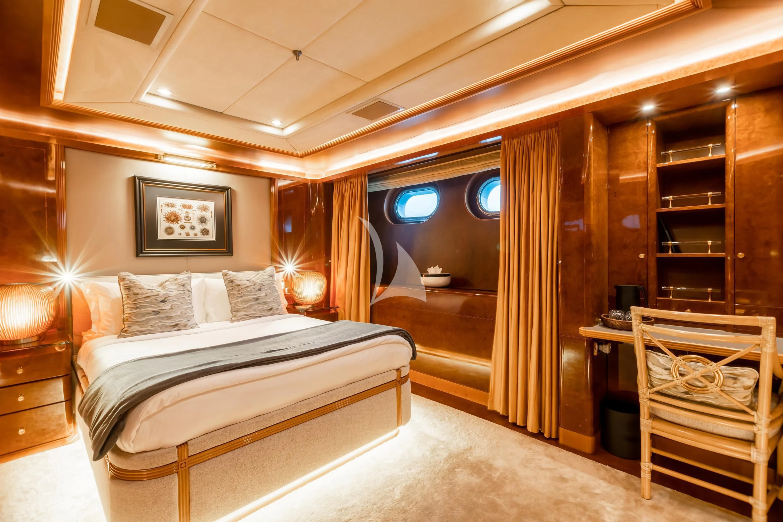 a room with a bed and a chair aboard AQUA MARE Yacht for Sale