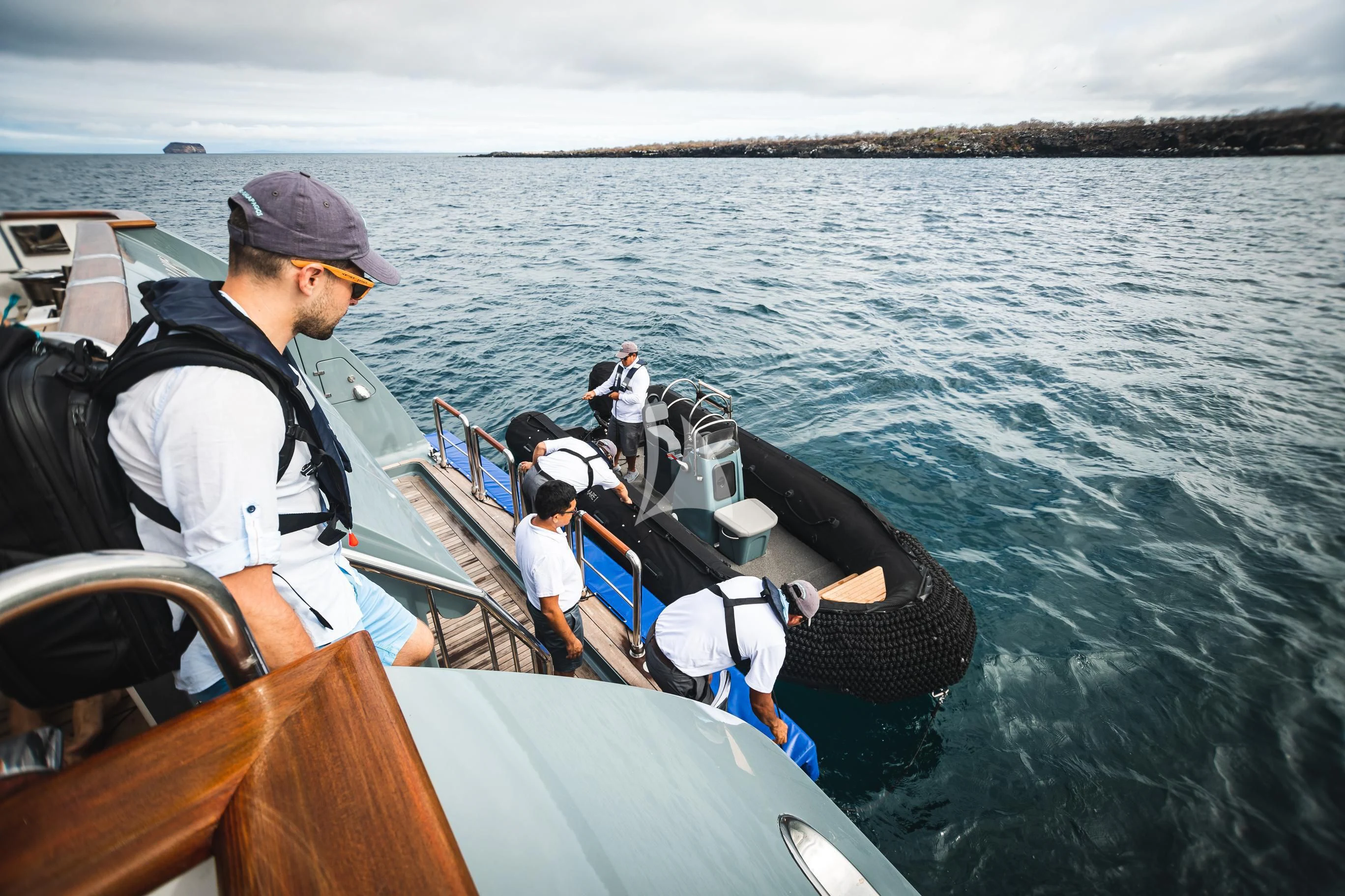 a group of people on a boat aboard AQUA MARE Yacht for Sale