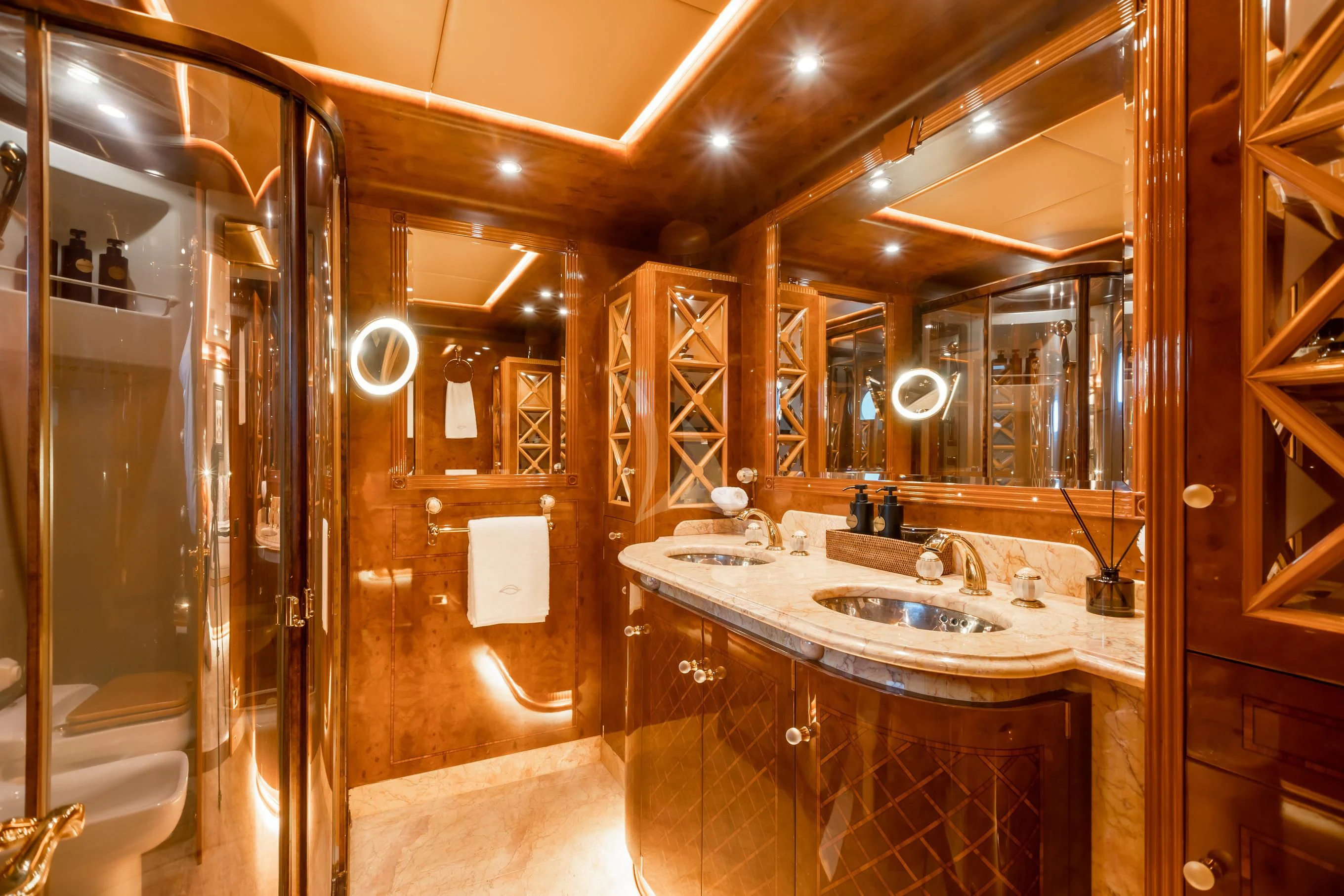 a bathroom with a large mirror aboard AQUA MARE Yacht for Sale
