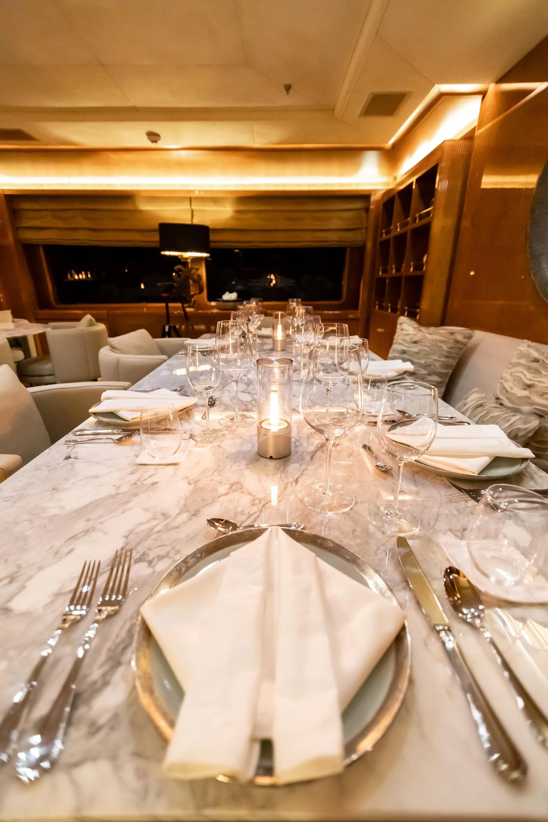 a table set with place settings aboard AQUA MARE Yacht for Sale