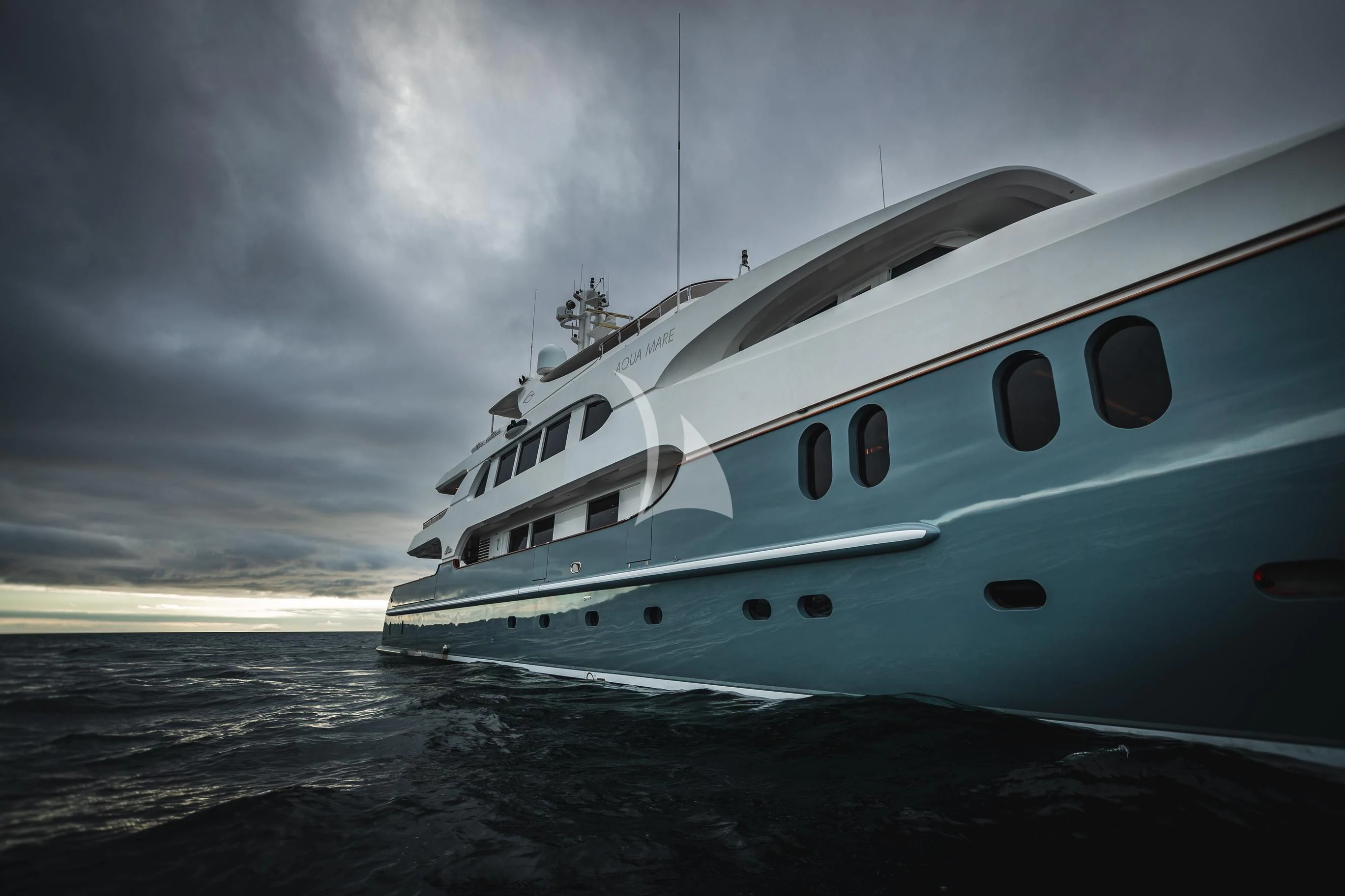 a white yacht on the water aboard AQUA MARE Yacht for Sale