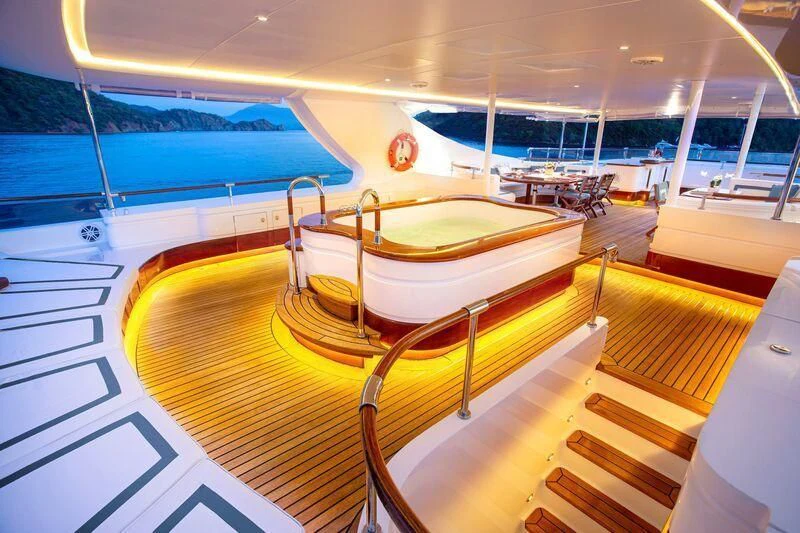 a boat on a deck aboard AQUA MARE Yacht for Sale