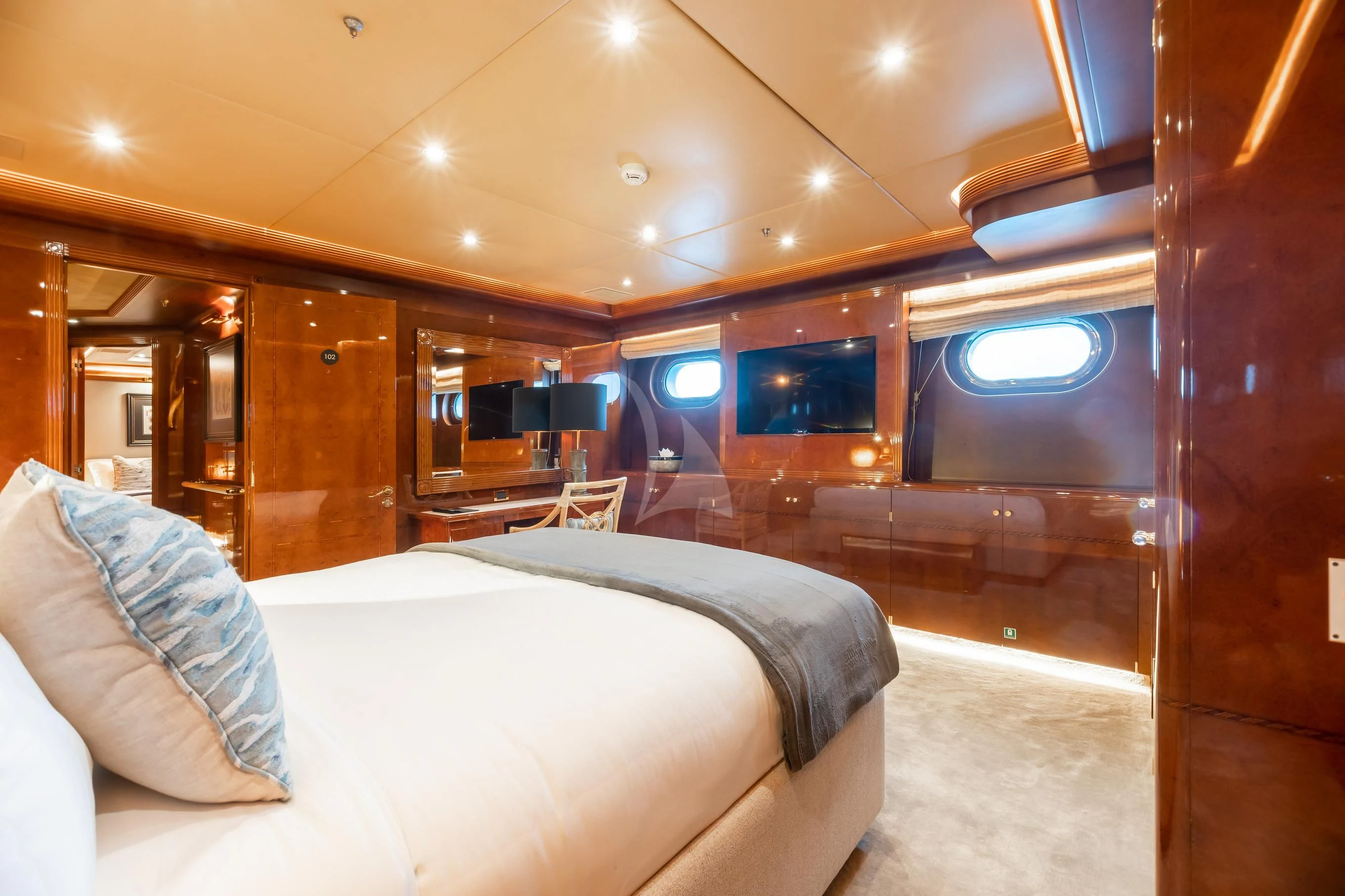 a room with a bed and a window aboard AQUA MARE Yacht for Sale