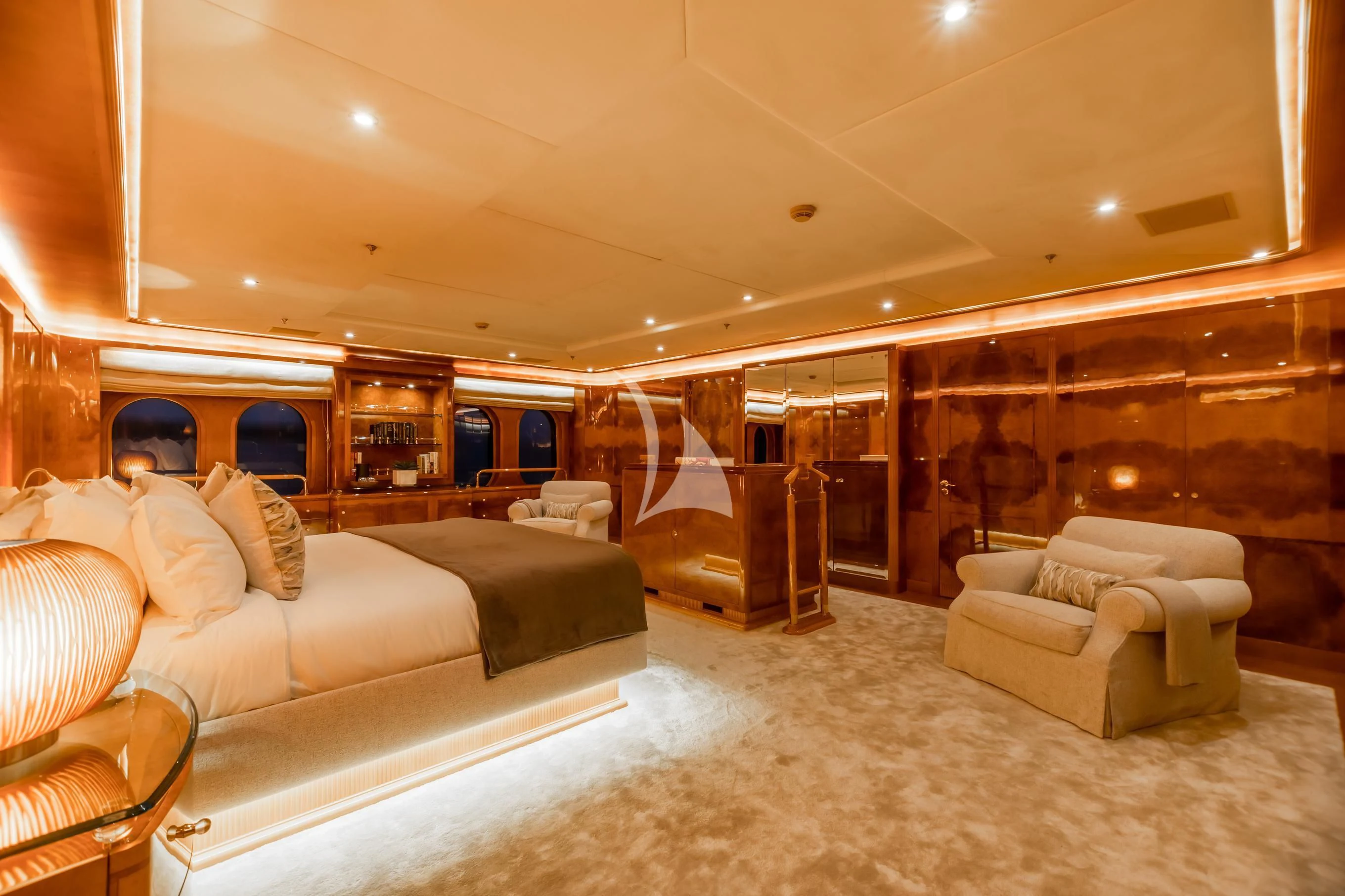 a large living room with a large glass wall aboard AQUA MARE Yacht for Sale