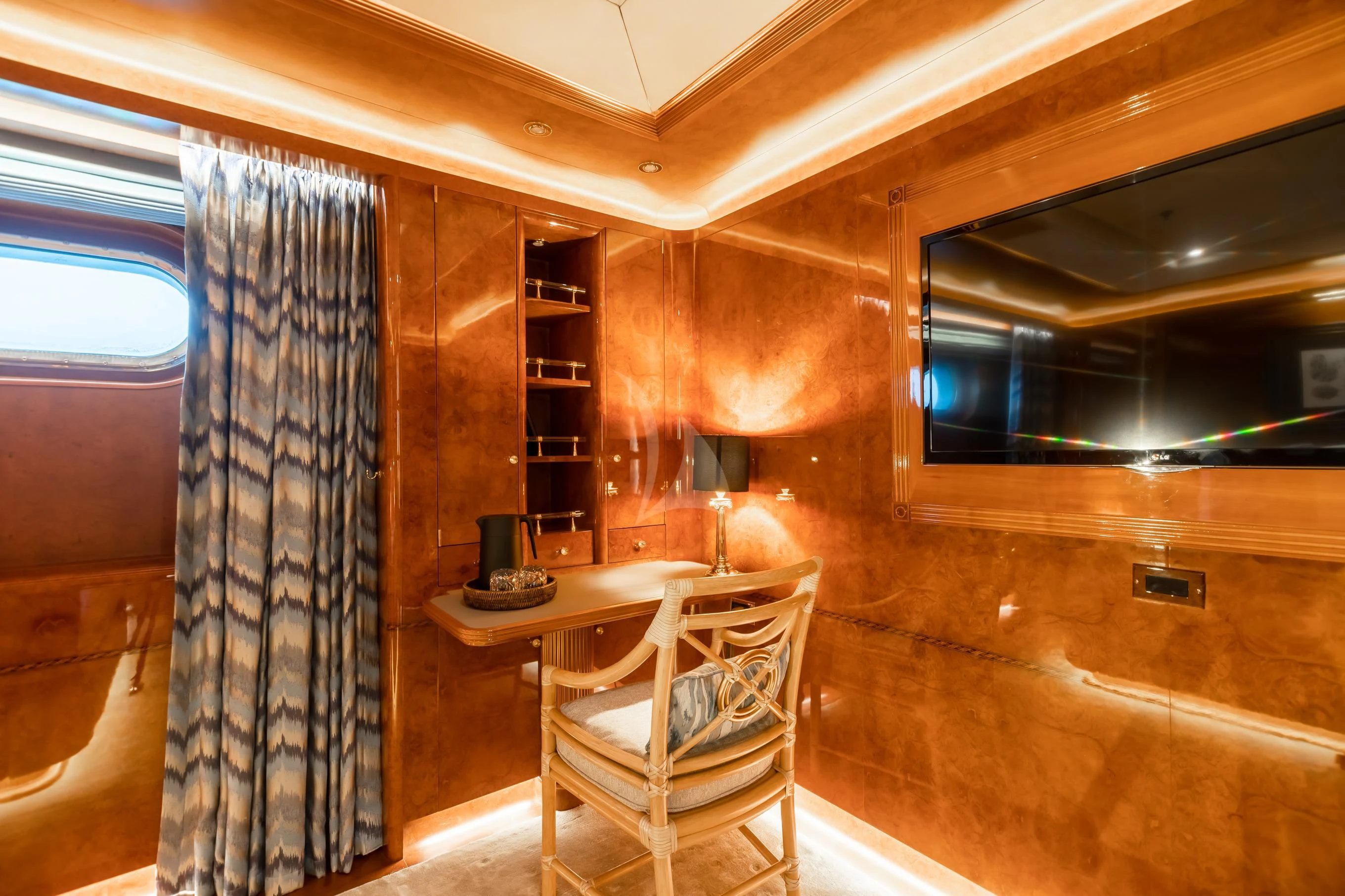 a room with a table and chairs aboard AQUA MARE Yacht for Sale