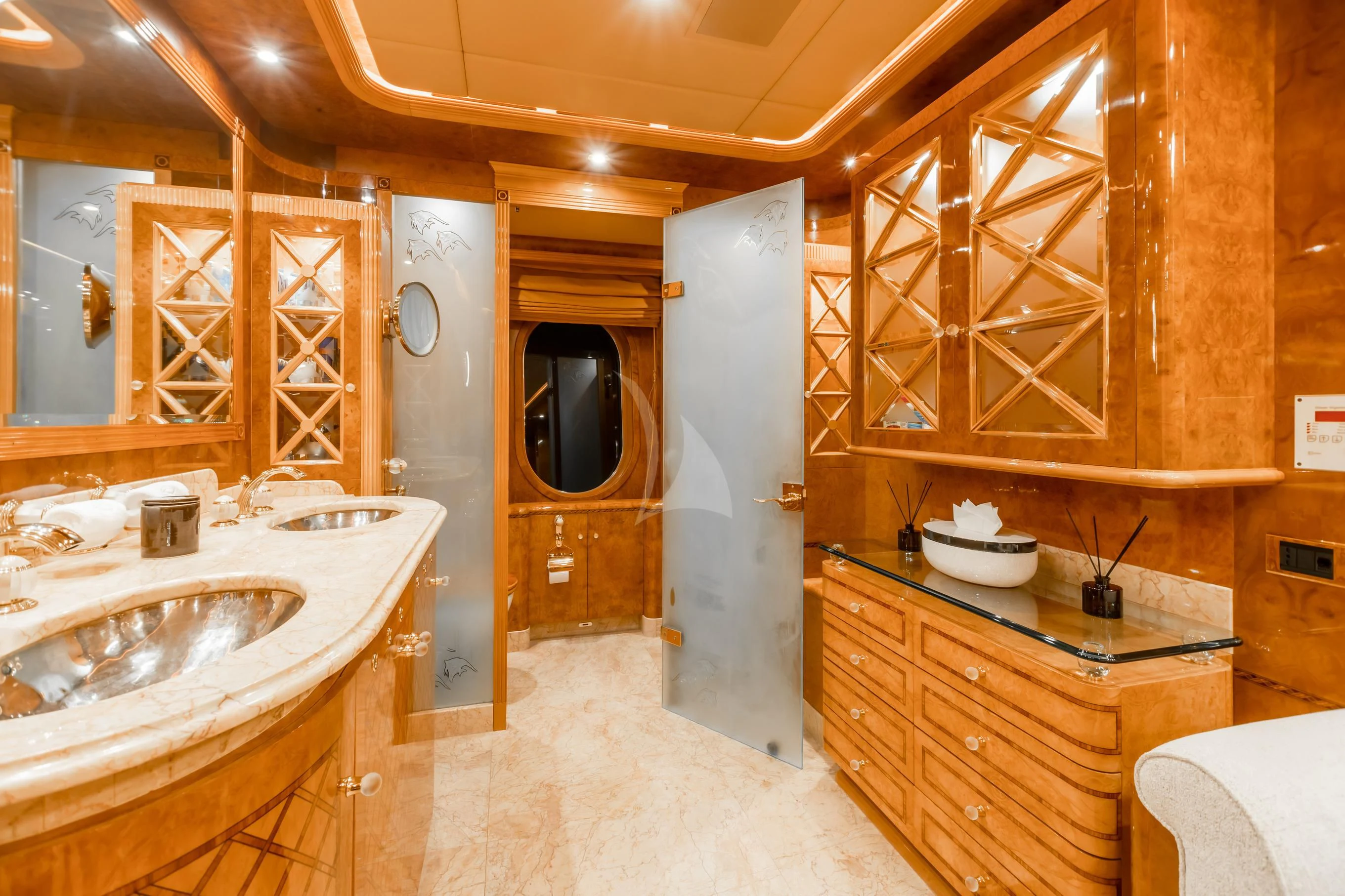 a bathroom with a sink and a mirror aboard AQUA MARE Yacht for Sale