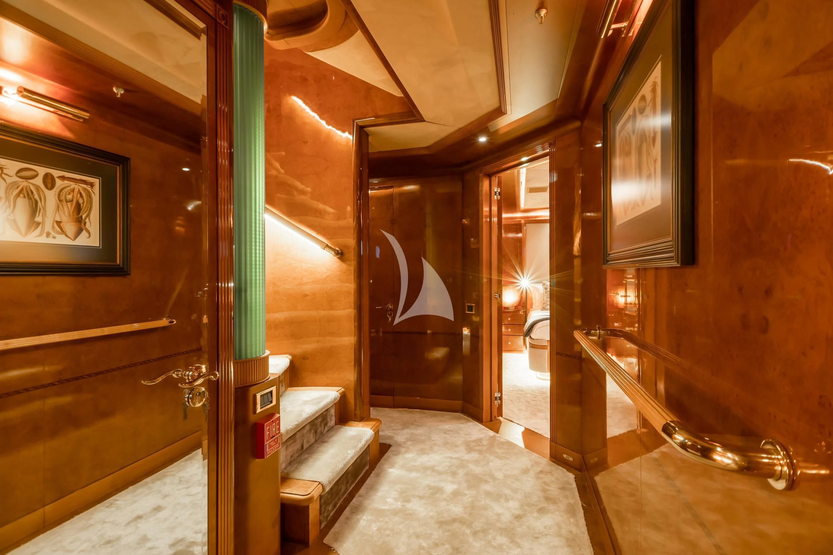 a room with a door and a bench aboard AQUA MARE Yacht for Sale