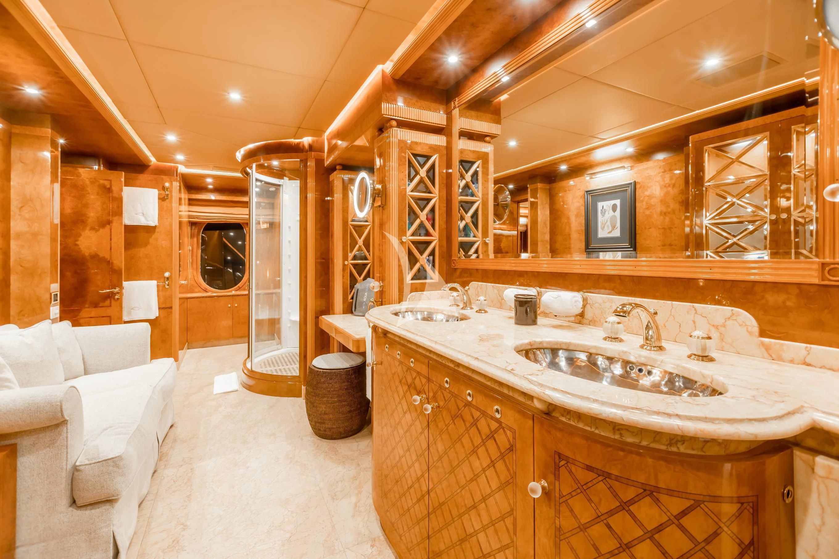 a bathroom with a sink and a bed aboard AQUA MARE Yacht for Sale