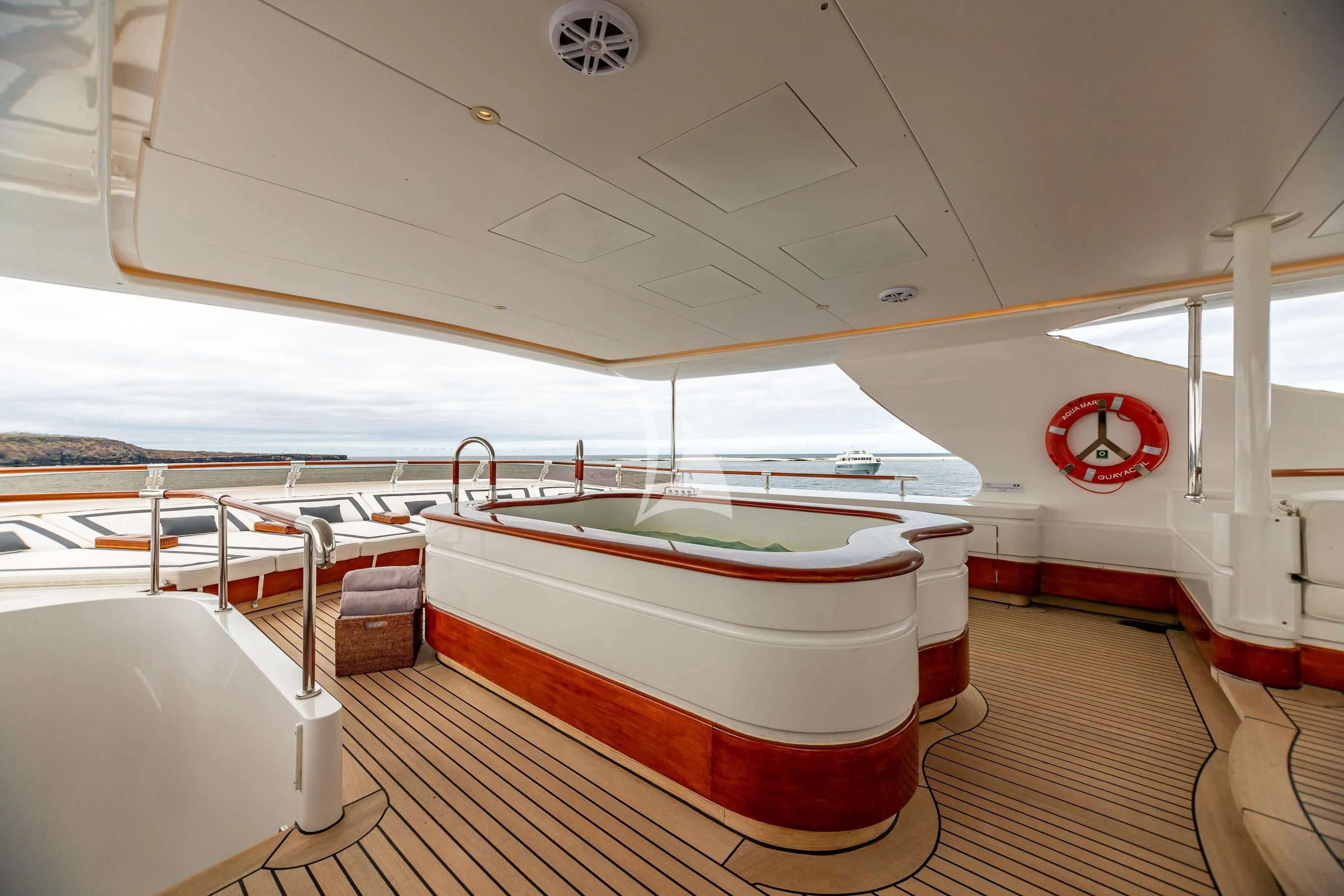 a boat with a red cover aboard AQUA MARE Yacht for Sale