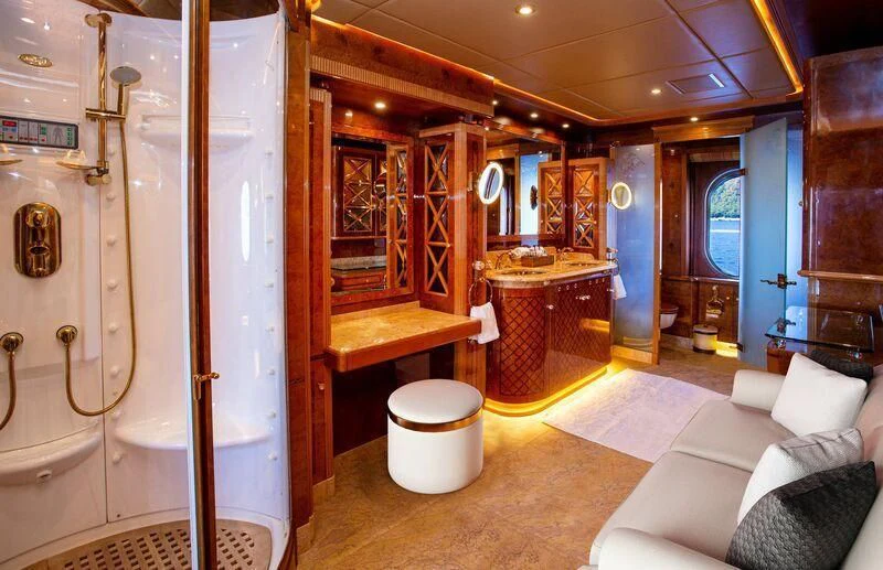 a bathroom with a toilet and a sink aboard AQUA MARE Yacht for Sale
