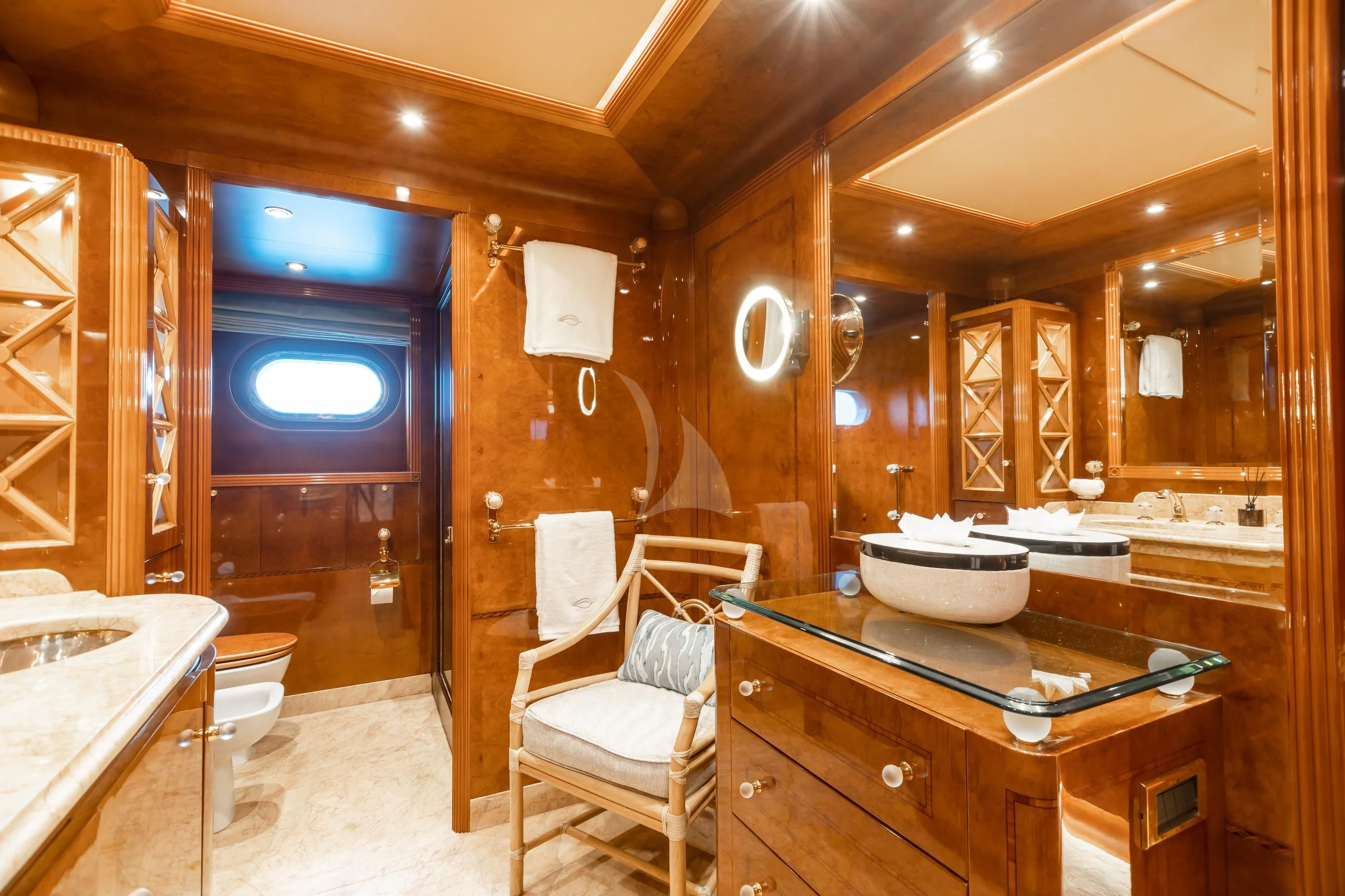 a kitchen with a bar and a table aboard AQUA MARE Yacht for Sale