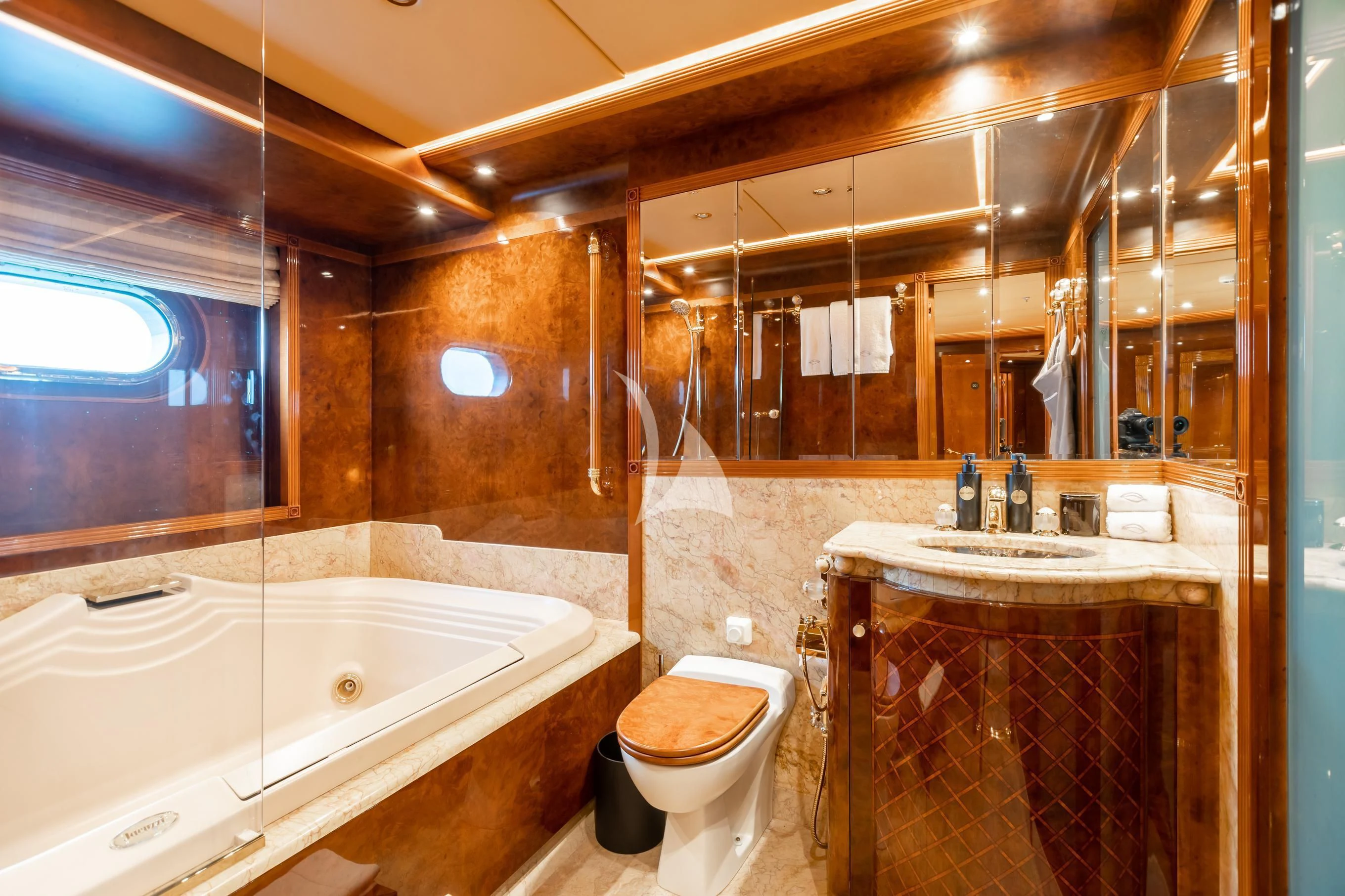 a bathroom with a sink toilet and bathtub aboard AQUA MARE Yacht for Sale