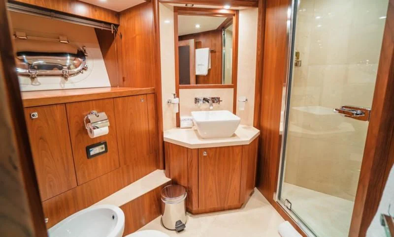 a bathroom with a sink and a shower aboard LUCIEN Yacht for Sale
