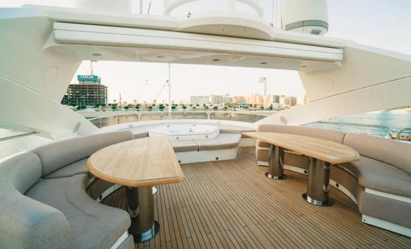 a room with a table and chairs aboard LUCIEN Yacht for Sale